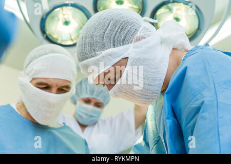 Surgeons during the operation Stock Photo