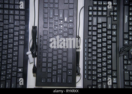 Chelyabinsk Region, Russia - February 2019. Black keyboard for a computer with a Russian font on the storefront. Stock Photo