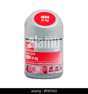 A pack of 14mg iron supplement tablets on a white background Stock Photo