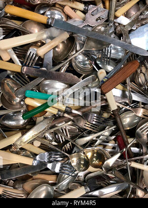 Pile of old cutlery - knives - forks - spoons Stock Photo