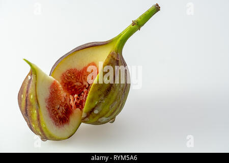 cut fig in front of white background Stock Photo