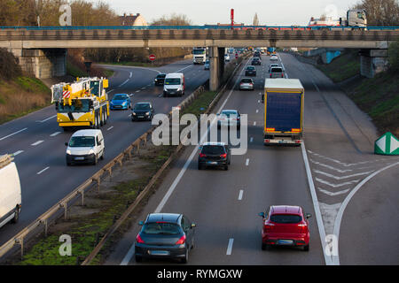 Cars driving on highway. Vehicle junction on the asphalt road, urban outdoor background, infrastructure and transportation concept. Stock Photo