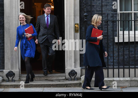 Chief Secretary to the Treasury Elizabeth Truss (left), Business Secretary Greg Clark and Works and Pensions Secretary Amber Rudd leaving 10 Downing Street, London after a meeting. Stock Photo