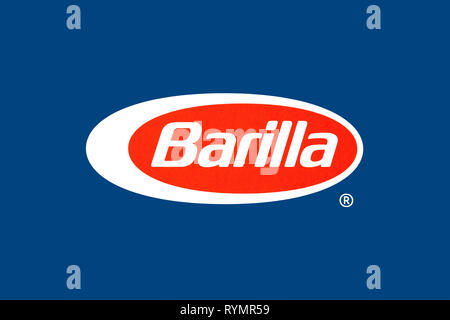 Barilla logo with a blue background. Barilla is an Italian food company that makes different types or pastas and sauces. Stock Photo