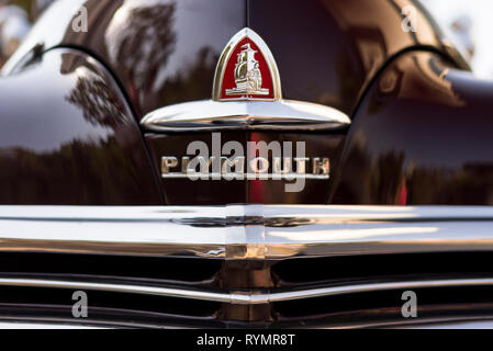 Izmir, Turkey - September 23, 2018: Emblem of a Black colored 1948 Plymouth Deluxe car Izmir Turkey. Stock Photo