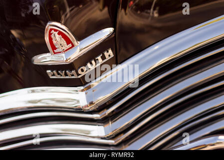 Izmir, Turkey - September 23, 2018: Emblem of a Black colored 1948 Plymouth Deluxe car Izmir Turkey. Stock Photo