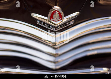 Izmir, Turkey - September 23, 2018: Emblem of a Black colored 1948 Plymouth Deluxe car Izmir Turkey. Stock Photo