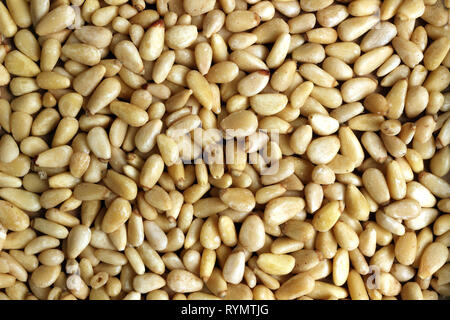 A close up of Pine nuts for background whole food texture Stock Photo