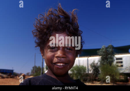 YOUNG ABORIGINAL BOY, YUELAMU ABORIGINAL COMMUNITY (MOUNT ALLAN SCHOOL) NORTHERN TERRITORY, AUSTRALIA. Stock Photo