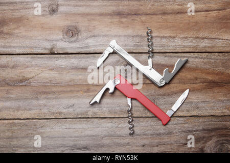 Multi Purpose Knife on Wooden Background Stock Photo