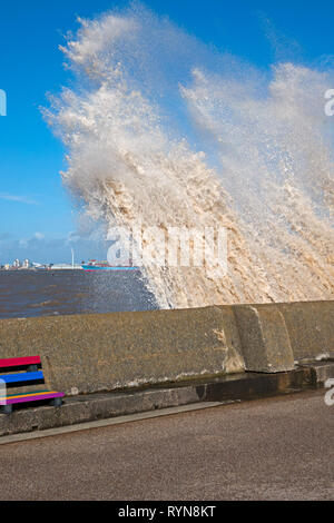 Huge waves crash over the sea wall at New Brighton Merseyside UK Stock Photo