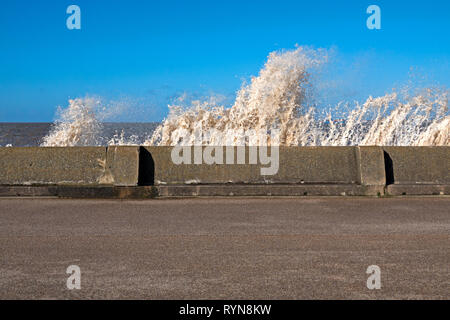 Huge waves crash over the sea wall at New Brighton Merseyside UK Stock Photo