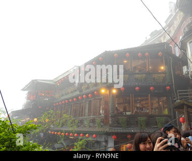 Jiufen Village old street tourist shopping in old Japanese gold mining town. Jiufen is a renowned tourist attraction representative of Taiwan Stock Photo