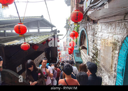 Jiufen Village old street tourist shopping in old Japanese gold mining town. Jiufen is a renowned tourist attraction representative of Taiwan Stock Photo