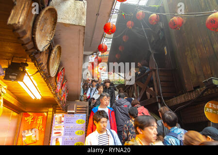 Jiufen Village old street tourist shopping in old Japanese gold mining town. Jiufen is a renowned tourist attraction representative of Taiwan Stock Photo