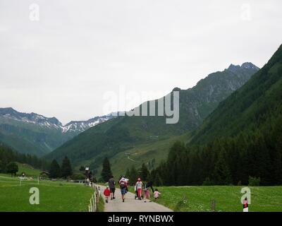 Family walking in the Ahrntal Valley, South Tyrol, Italy Stock Photo