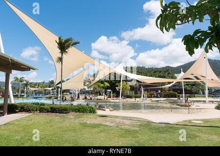 Airlie Beach, Australia November 5, 2017: Tourists and locals enjoy the Airlie Beach Lagoon on a warm summer day Stock Photo