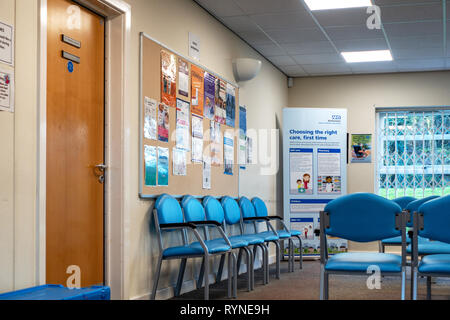 Interior of a GP doctor's surgery with an empty chair and bed Stock ...