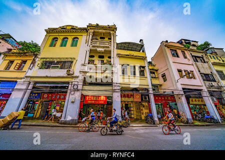 GUANGZHOU, CHINA - OCTOBER 24: Old traditional city buildings and shops on a street near Sanxiajiu shopping district on October 24, 2018 in Guangzhou Stock Photo