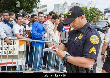 Miami Florida,Riverside Center,government administration building,city job applicant,application,city,firefighter,line,queue,unemployment,economy,Blac Stock Photo