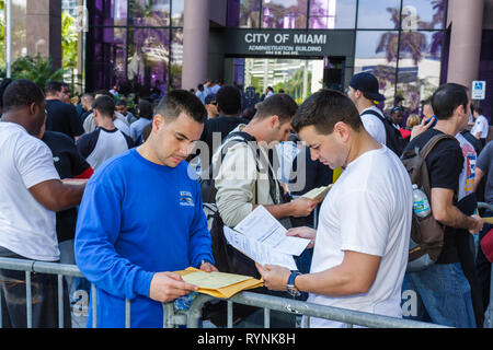 Miami Florida,Riverside Center,government administration building,city job applicant,application,city,firefighter,line,queue,employment,unemployment,e Stock Photo