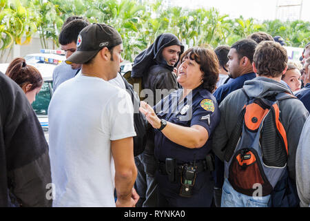 Miami Florida,Riverside Center,government administration building,city job applicant,application,city,firefighter,line,queue,unemployment,economy,Blac Stock Photo