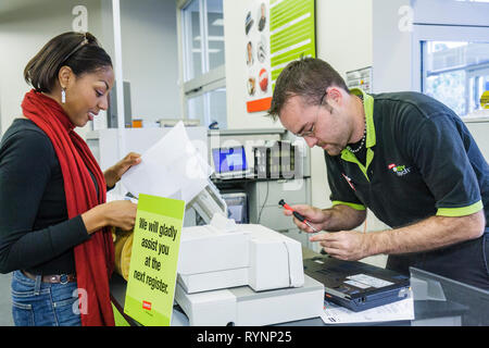 Miami Florida,Staples,office supply products store,retail,chain,Black Blacks African Africans ethnic minority,adult adults woman women female lady,man Stock Photo