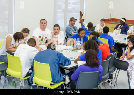 Miami Florida,Little Haiti,Cultural Complex Center,MLK Day of Service,EPA Day,volunteer volunteers volunteering work worker workers,working together h Stock Photo