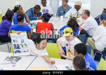 Miami Florida,Little Haiti,Cultural Complex Center,MLK Day of,EPA Community Day,volunteer volunteers volunteering work worker workers,working together Stock Photo