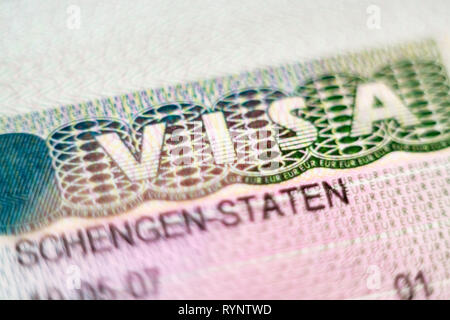 KYIV, UKRAINE - FEBRUARY 2019: close up macro of Schengen European Union visa header in passport. Stock Photo
