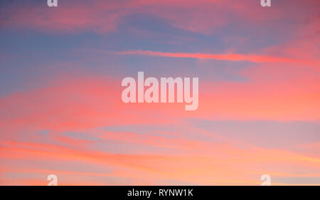Red sky with blue clouds Stock Photo