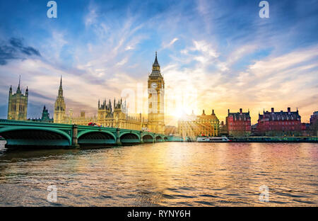 London cityscape with Big Ben and City of Westminster Abbey bridge in sunset light, in United Kingdom of England Stock Photo