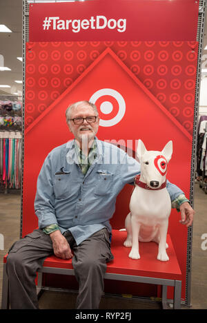 Man posing with Target Dog in Target store. Stock Photo