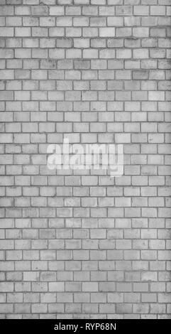 Full frame background of detailed old brick wall in black and white. Stock Photo
