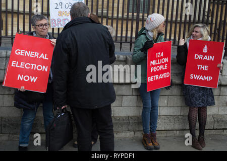 London, UK. 14th Mar, 2019. Pro Brexit supporters outside the Houses of Parliament before MPs voted by majority of 210 to extend article 50 and delay Brexit beyond deadline day - March 29. Credit: Thabo Jaiyesimi/Alamy Live News Stock Photo