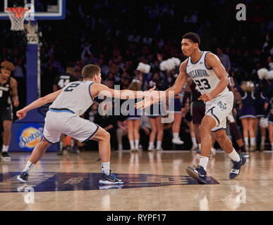 March 14, 2019 - New York, New York, U.S. - Villanova Wildcats guard Collin Gillespie (2) and forward Jermaine Samuels (23) celebrate in the second half during Big East Tournament quarterfinals between the Villanova Wildcats and the Providence Friars at Madison Square Garden in New York City. Villanova defeated Providence 73-62. Duncan Williams/CSM Stock Photo