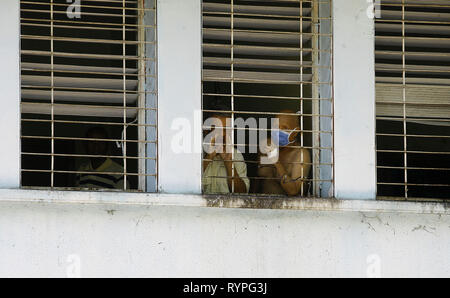 Valencia, Carabobo, Venezuela. 14th Mar, 2019. March 14, 2019. Sick people who remain hospitalized for different reasons shouted their complaints to the press that visited the central hospital Enrique Tejera, hours before the visit of the human rights commission of the United Nations organization, led by the former Chilean president, Michelle Bachelet . Doctors, relatives of patients and their own patients reported that many patients die when they do not receive adequate treatment due to a shortage of medicines, food, water and even lack of cleanliness in the facilities of the hospital. In t Stock Photo