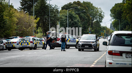 Christchurch, New Zealand. 15th Mar, 2019. Police are seen at a road block in Christchurch, New Zealand, March 15, 2019. At least 27 people were killed in multiple shootings in the two mosques of New Zealand's Christchurch on Friday afternoon, and police said they have arrested four suspects so far. Credit: Zhu Qiping/Xinhua/Alamy Live News Stock Photo