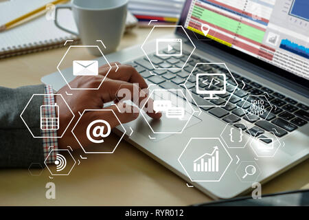Man using  tablet computer  virtual interface graphic icons network diagram Digital marketing Stock Photo