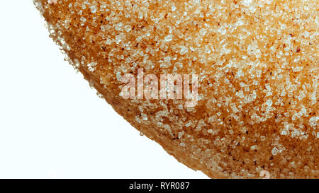 Macro image of part of a cinnamon and sugar doughnut on a white background for copy space Stock Photo