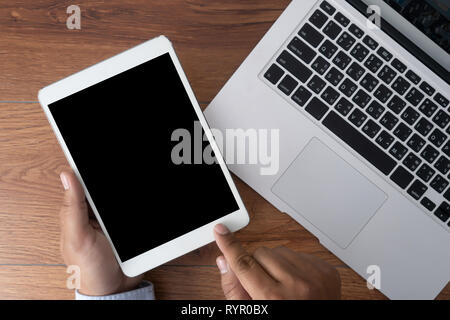Man hand holding the black smartphone screen mockup Stock Photo
