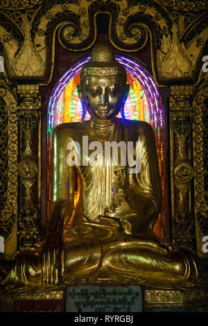 Gold buddha statue at Schwedagon Pagoda, Yangon, Myanmar Stock Photo