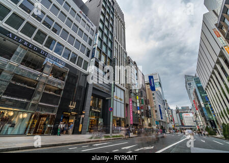 People walking and shopping along Chuo Dori street on Sunday in upscale ...
