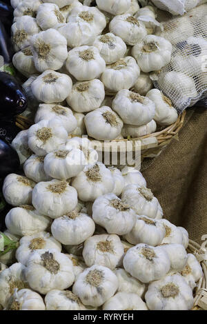 Garlic in wicker baskets Stock Photo