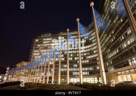 Europe flags in front of the Berlaymont building, seat of the European Commission, night shot, Europaviertel, Brussels, Belgium