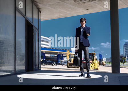 young businessman is upset having suffered failure in finances and at work Stock Photo
