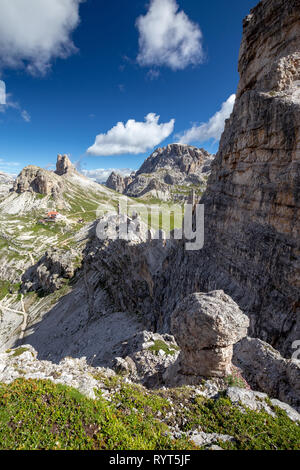 Mountain wall of Monte Paterno. In background Sasso di Sesto, Torre di Toblin mountains. The Locatelli alpine refuge. The Sexten Dolomites. Italy. Stock Photo