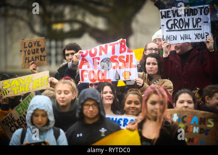 Swansea, Wales, UK. 15th March 2019 Pictured are students and children marching through the steet's of the city of Swansea in South Wales, UK, in the latest climate change protests. Inspired by 16-year-old environmental activist Greta Thunberg, who has accused world leaders of not doing enough to prevent climate change, youngster have taken to the streets in the UK and across the world to try and highlight the cause for positive action regarding climate change. Robert Melen/Alamy Live News. Stock Photo