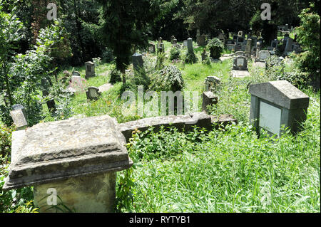 Cimitirul evenghelic (Lutheran cemetery) on Hilltop School in Cetatea Sighisoara (fortified historic centre of Sighisoara) built in XII century by Tra Stock Photo