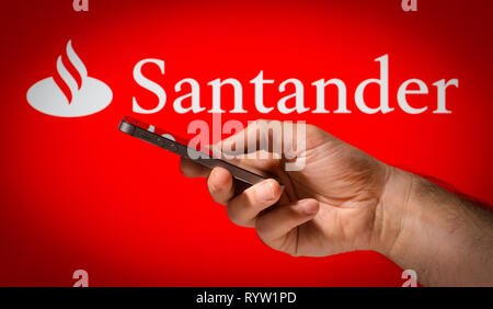 Santander mobile online banking Stock Photo